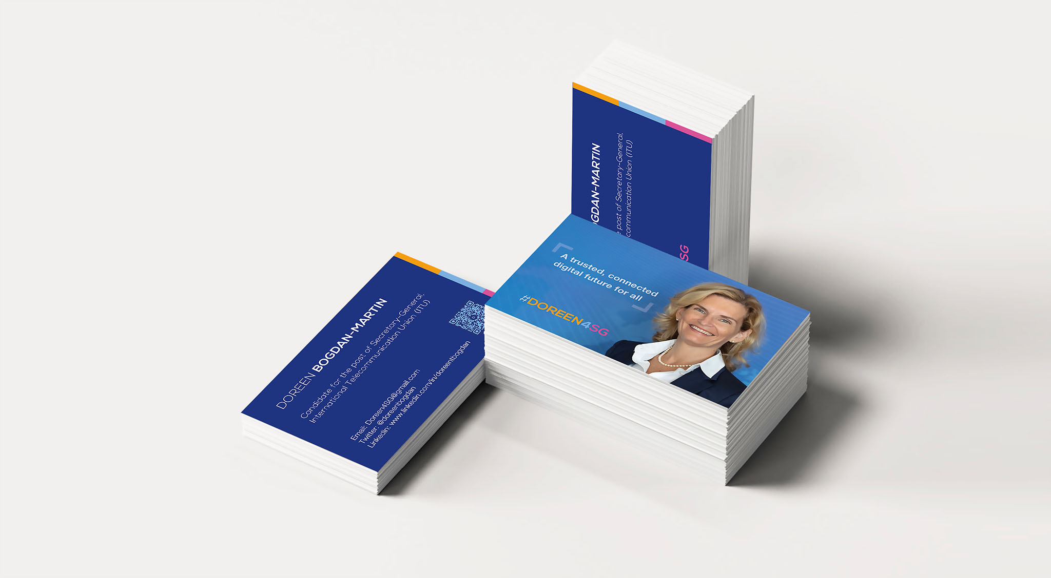 Image showing business cards with a woman on the front face - digital and print marketing samples created by SmartCuts Creative in Lausanne and Geneva, Switzerland.