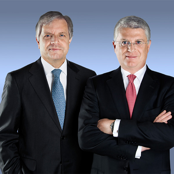 Corporate photograph of two men in suits taken by SmartCuts Creative, based in Lausanne and Geneva, in Switzerland.